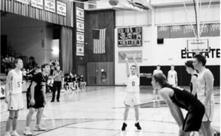 FM Bank Player of the Game Connor Mitchell, with little time left on the clock, calmly went to the line and drilled two free throws- assuring the Cards victory against Nelson County. Photo by Larry Stokke