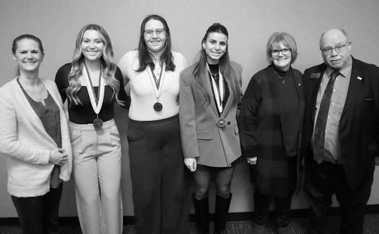 Tammy Riggin, LRSC Phi Theta Kappa co-advisor, Morgan Thielbar, Megan Green, Carla Moros, Teresa Tande, Phi Theta Kappa advisor emerita, and LRSC President Dr. Doug Darling. Submitted photo.