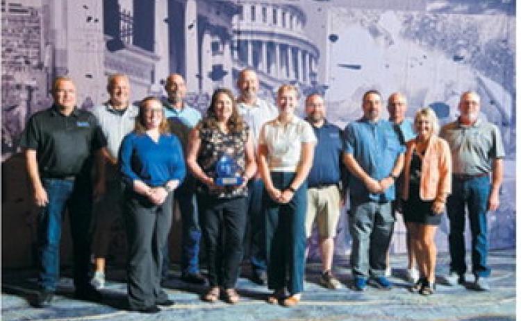 Members of the North Dakota Rural Water Systems Association pose with the Outstanding Achievement in Member Services award during the 2026 WaterPro Conference in Phoenix. The National Rural Water Association presented the award Sept. 15 in recognition of NDRWSA’s service and support to member water and wastewater utilities.