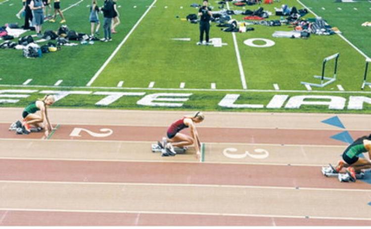 Hallie Overby prepares for the 200-meter dash at the Pembina County Indoor, where she placed third. Submitted photo