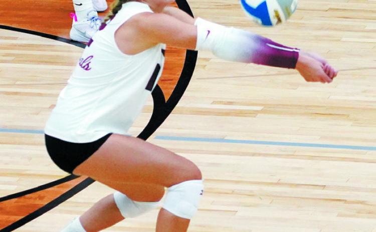 Kemi Morstad had 18 digs for the Cardinals in the game against the Cavalier Tornadoes on Sept. 5 in Langdon. Photo by Larry Stokke.