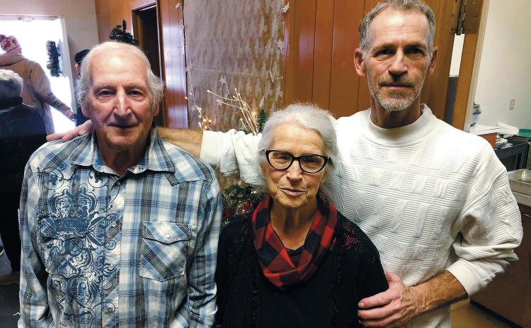 Joe, Amy, and Dale Phillips at a previous Walhalla’s Annual Christmas Dinner. Photo by Melanie Thornberg.