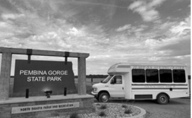 Pembilier Nursing Center residents enjoy the scenic views during a bus ride through Pembina Gorge State Park on Sept. 11. Submitted photo