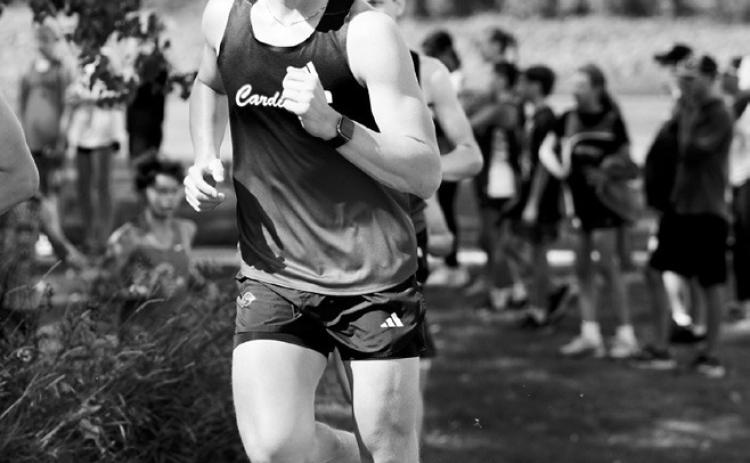 Langdon Area-Munich’s Ty Ramberg competes in the Carrington Cross-Country Meet on Sept. 1. Ramberg placed 51st in the boys varsity 5,000-meter race with a time of 20 minutes, 56 seconds. Photo by Larry Stokke