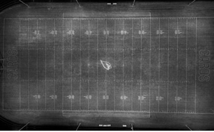 A drone photo captures the Langdon Area-Munich Cardinals logo painted at midfield for the homecoming football game Friday, Oct. 9. The impressive design was created by Terner Askvig, an eighth grader at Langdon Middle School, using robotic painting technology. Terner is the son of Ethen and Jayla Askvig and grandson of Ray and Wanda Howatt. Drone photo by Terner Askvig