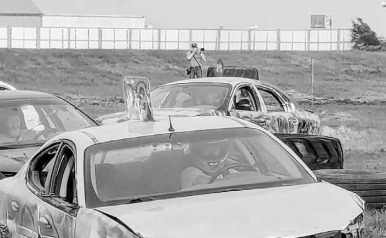 Larry in the Wild: Like a rare creature in his natural habitat, Borderland Press photographer Larry Stokke was spotted at the Bush and Redneck Truck Races during the Pembina County Fair, caught mid-click by Kristina Halverson. See Larry? Snap a pic and send it our way. Your photo could be the next ‘Larry in the Wild’ sighting we publish!