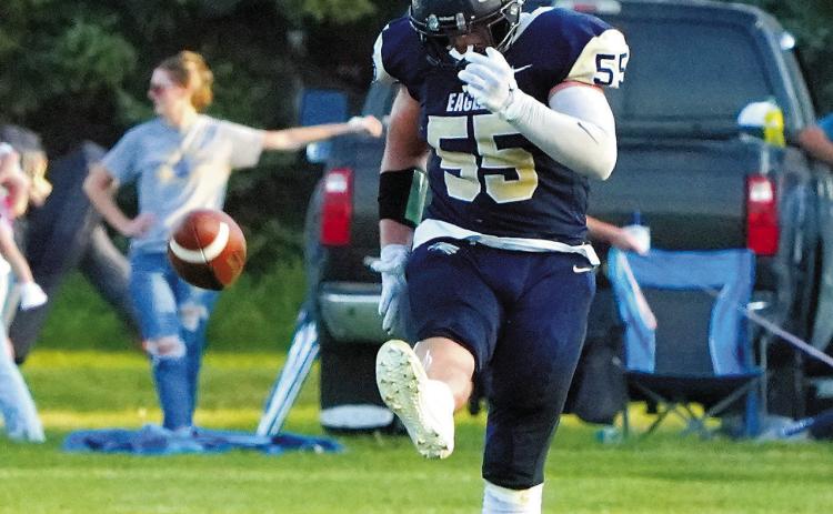 Gavin Symington kicks to the receiving Indians in Walhalla on Aug. 29. Photo by Larry Stokke.