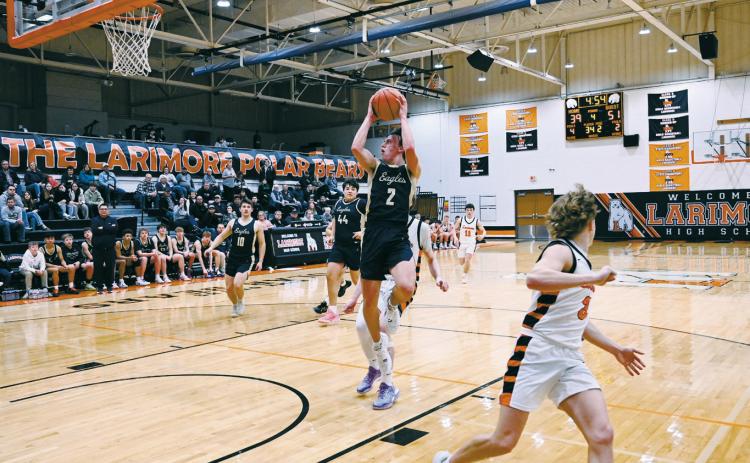 Kaden Moore breaks away for a shot in the Eagles’ win against Larimore. Photo by Ashely Shafer.