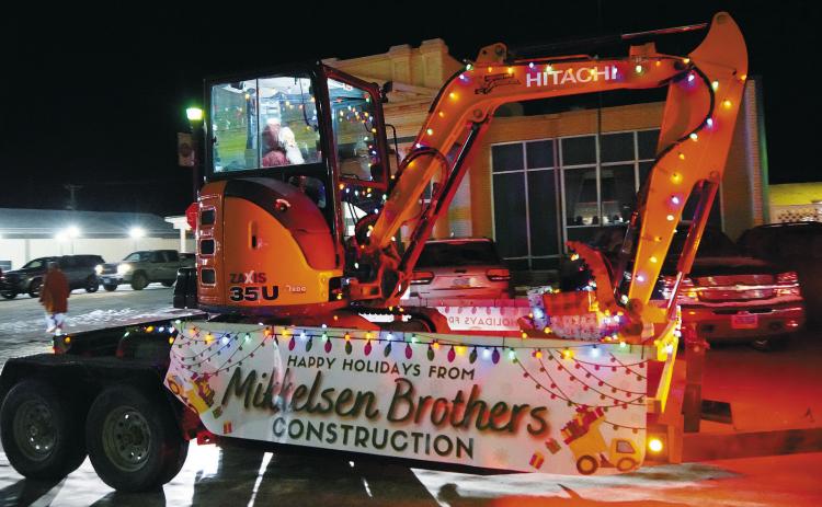 Mikkelson Construction earned second place in the parade. Photo by Larry Stokke.