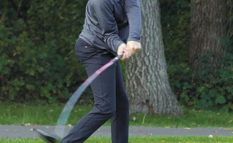 Kadence Wirth puts some bend in her club as she tees off at the Region 4 Golf Tournament Photo by Larry Stokke.