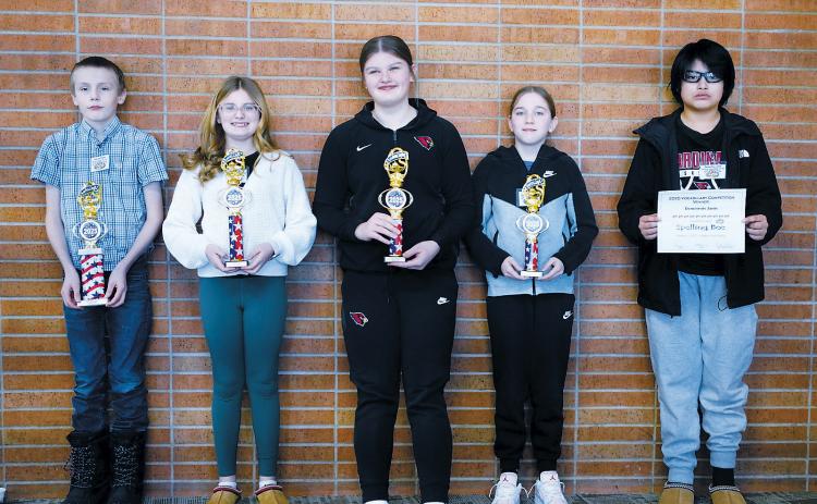Last week, the Cavalier County Spelling Bee and Vocabulary Contest was held. Here are the winners from left to right: 1st place Aaron Miles of Munich School, 2nd place Paisley Feil of Langdon School, 3rd place Fenja Lawson of Langdon School, 4th place Sophia Longie of Munich School, and the winner of the written spelling competition, Demetrius Janis of Langdon School. Photo by Larry Stokke.