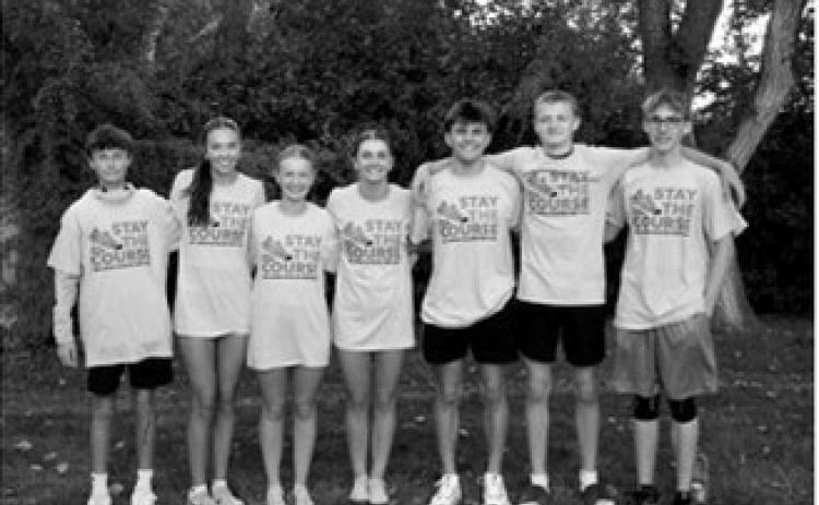 Top-10 finishers at the NR-S Cross Country Meet are, from left, Prestyn Bodnar, third; Olivia Lorenz, seventh; Emersen Helgoe, fifth; Shirley Kemp, third; Nash Fitzsimonds, sixth; Nolan Pelletier, 10th; and Ethan Kendell, ninth. Photo by Larry Stokke.
