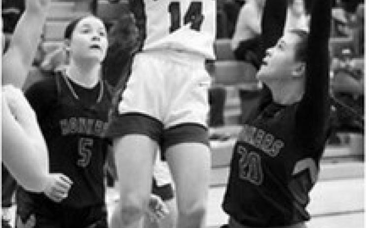 Hillary Haaven was the FM Bank Player of the Game against Kenmare/Bowbells on Saturday, Feb. 7 in the last home game in Langdon. She finished the game with five 3-point baskets and had 21 points for the game. Photo by Larry Stokke