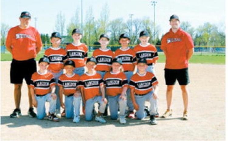 Back row from left: Coach Krivarchka, Caden Downs, Aksel Bredeson, Grady Zeis, Hunter Jacobson, Jaxtin Overby, Coach Schaefer. Front row from left: Jack Schaefer, Miles Flink, Baylor Krivarchka, Jordan Pengilly, Sean Marceaux. The Red Sox finished their season with a 13-5 record.