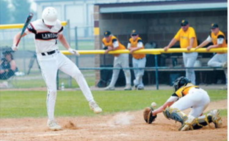 Austin Wenzel avoids a wild pitch during Langdon's District 3 tournament game against Park River in Grafton on July 16. Photo by Larry Stokke
