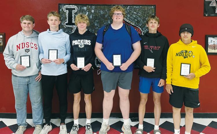 Boys track and field award winners (L-R) Reed Scherr-Weight Room Champ, Cody Amble-Most Valuable Sprinter and Most Varsity Team Points, Caleb Mcdonald-Most Improved, Jacob Lowery- Most Valuable Thrower, Tj Henderson-Most Improved, and Gavin Trotier-Jr High Most Points.