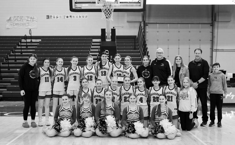 The Lady Cardinals 5th place team photo. Photo by Larry Stokke.
