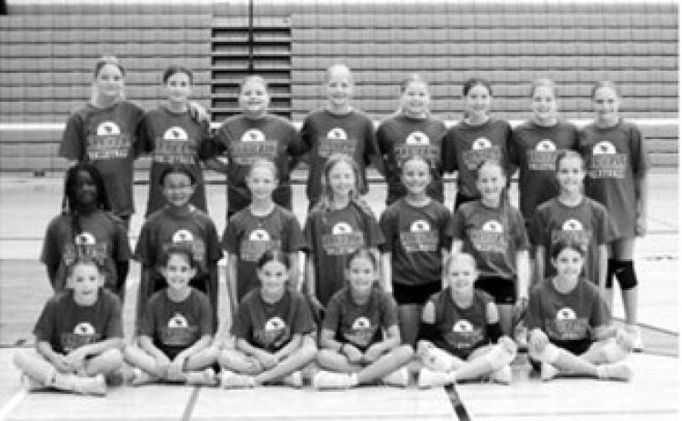 Participants in the fifth- and sixth-grade session of the Cardinal Volleyball Skills Camp pose for a group photo July 13-15. The camp was led by Cardinal head volleyball coach Rich Olson and coaches Aubree Page and Bree Vosberg. Assisting with the camp were Cardinal volleyball players Aubrey Badding, Kemi Morstad and Hilary Haaven. Photo submitted.
