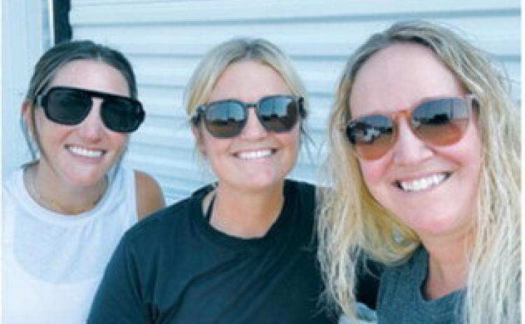 From left, concession stand volunteer organizers Myca Flink, Emily Schaefer and Jessica Pengilly thank the community for a great summer. They also thanked Farmers Union, The Bread Pan Bakery and Langdon Locker for their support and partnership.