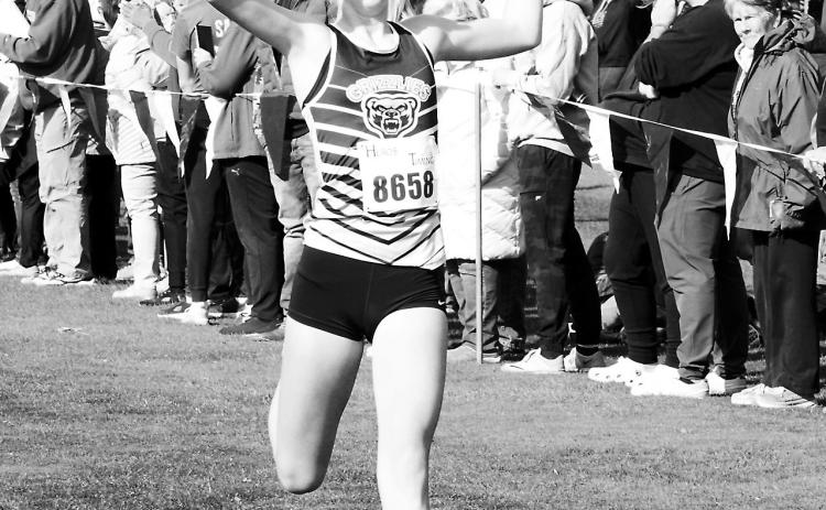 Maci Puppe had a great finish at the Regional Cross Country Meet placing 8th out of 263 competitors. Photo by Larry Stokke.