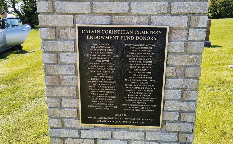 New plaque featuring the names of those who donated to the Calvin Corinthian Cemetery Fund. Photo by Terrence Henriksen.