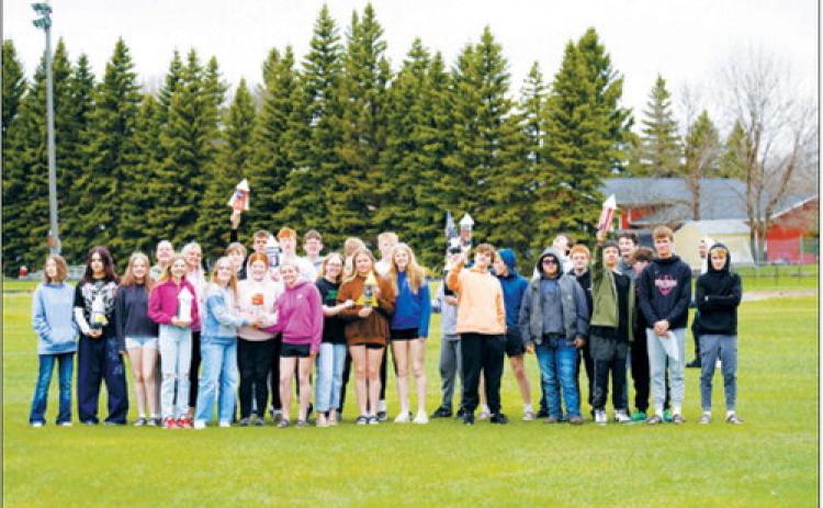 Eighth-grade students gather on the football practice field before the annual Bottle Rocket Challenge, a hands-on engineering project in Rich Olson’s Exploring Technology class. Photo by Larry Stokke