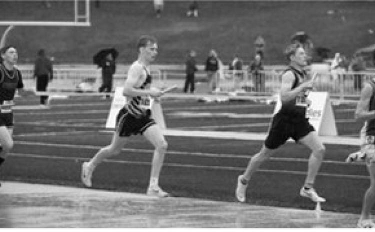 Owen Crosby runs a leg of the 4x800-meter relay for Pembina County North. The team of Owen Crosby, Micah Crosby, Ethan Kendell and Jaxon Suedel placed 12th with a time of 9:08.13 at the NDHSAA Class B State Track and Field Meet. Photo by Ashley Schafer