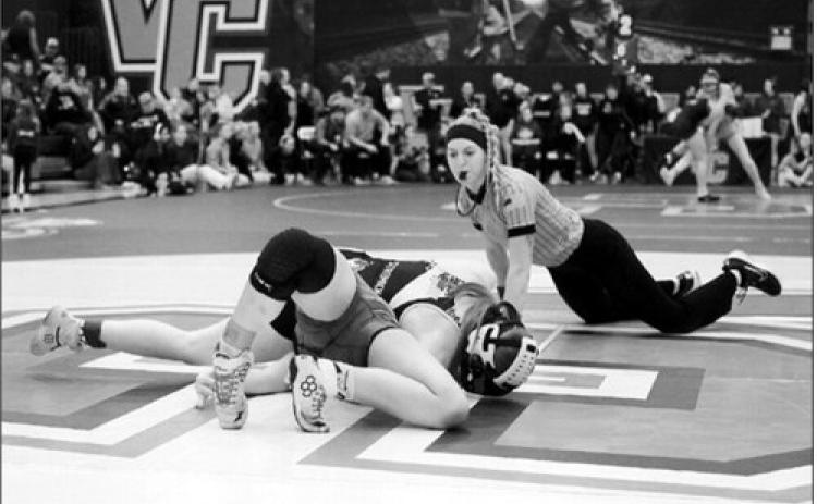 Marlie Stremick had a quick win with a 58 second pin over her opponent. Photo by Larry Stokke
