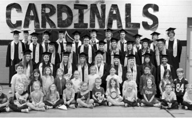 Members of the Langdon Area High School Class of 2026 pose for a photo with the future graduating Class of 2037 kindergarten students during a special full-circle moment celebrating past memories and future milestones. Photo by Larry Stokke