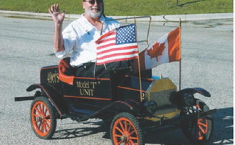 Rodney O’Brien of the Kem Shriner’s drives a miniature Model-T down main street during the first annual Pre-Blast-Bash. Photo by Larry Stokke