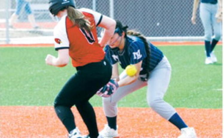 Kadence Wirth beats the throw to second base. Photo by Larry Stokke