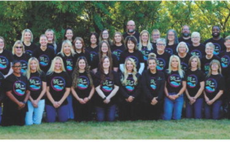 Langdon Prairie Health staff members gather for a group photo as the organization celebrates 55 years of providing health care to the community. Photo by Larry Stokke