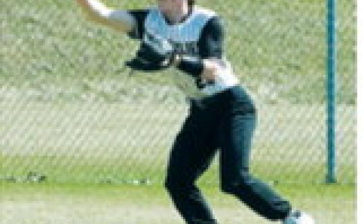 Noah Olson makes a barehanded catch in the outfield for an out against Grafton on May 8 in Pembina. Photo by Larry Stokke